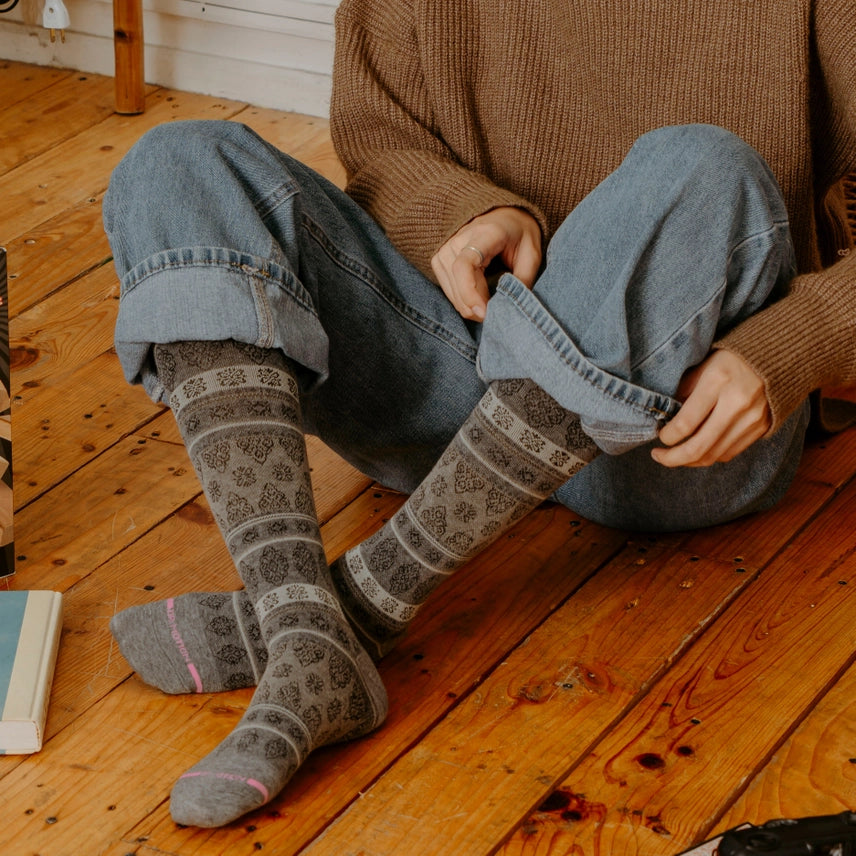 striped patterned compression socks with jeans