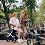 Rollz Flex Rollator walker with a seat